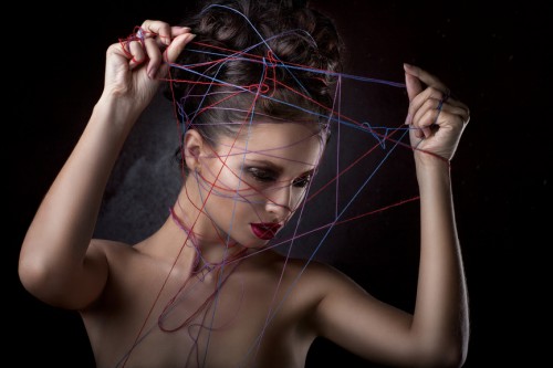 girl in a web of threads.
